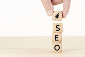 Building blocks that spell out "SEO" (technical SEO agency)