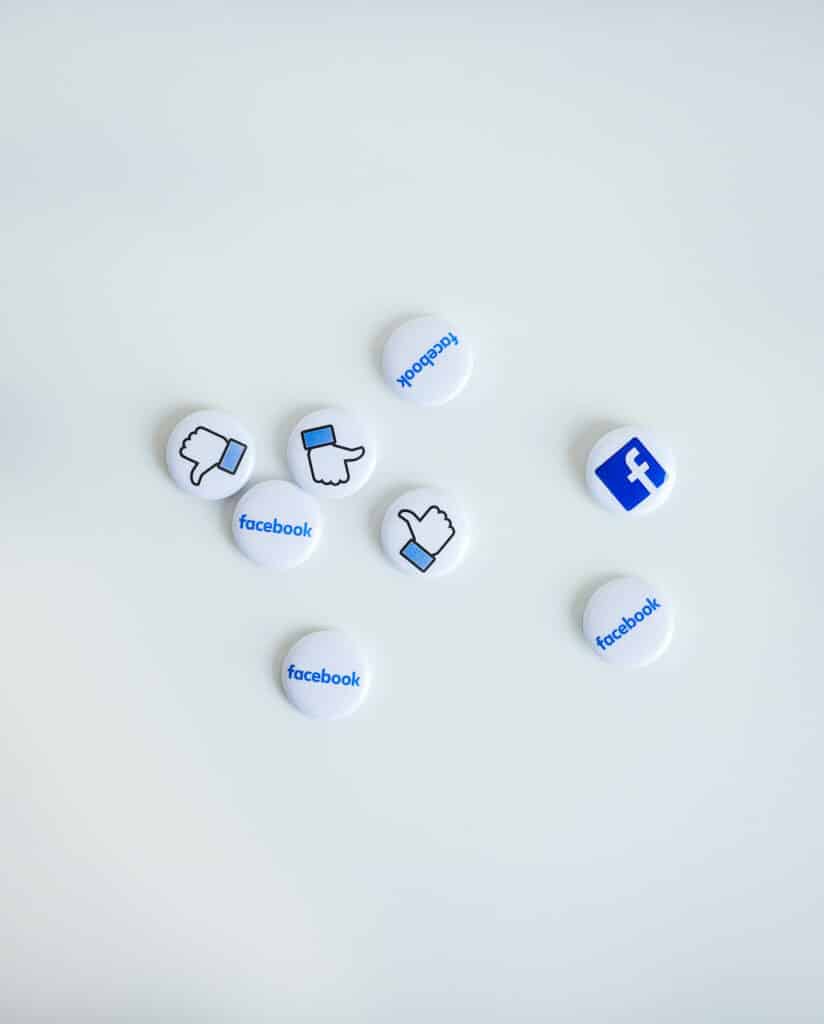White buttons that say "facebook" or the "like" symbol