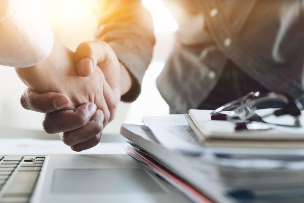 Two people shaking hands
