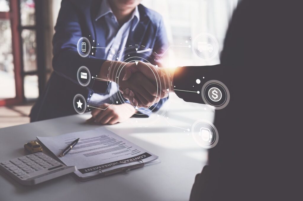 Two businesspeople shaking hands