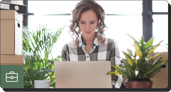 Woman typing on her laptop