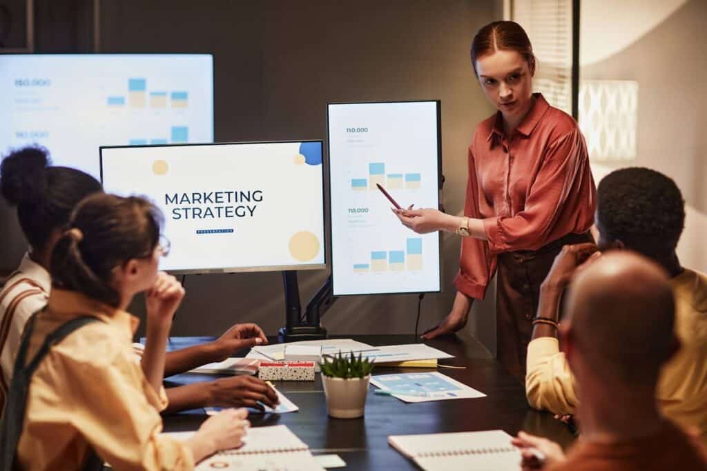 Marketing strategy meeting with team discussing marketing automation