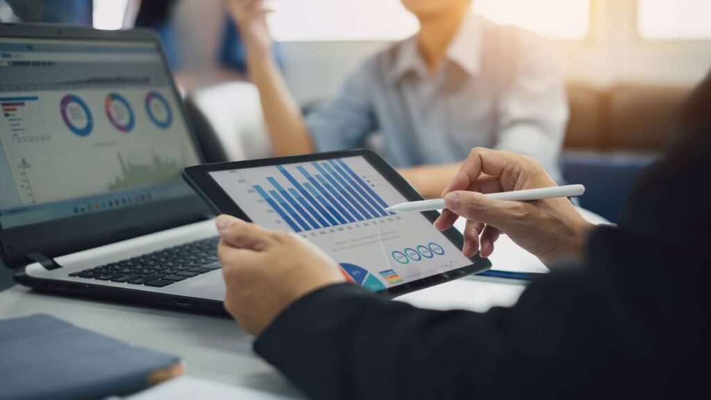 Marketing consultant analyzing statistics
