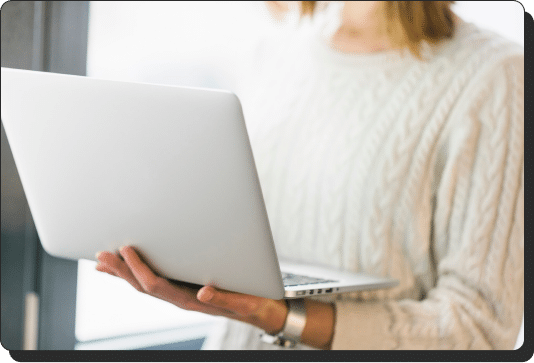 Woman holding a laptop