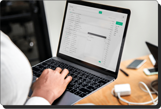 Woman checking email on a laptop