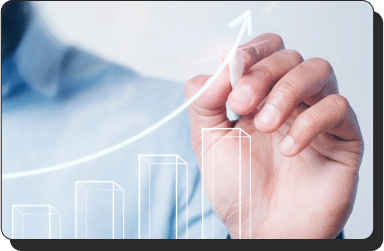 A person in a light blue shirt is using their index finger to draw an upward trending arrow over a bar graph, implying lead generation and success. The background is blurred to emphasize the focus on the hand and the graph.